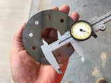 Clamp to spokes Chain sprocket alignment disc.