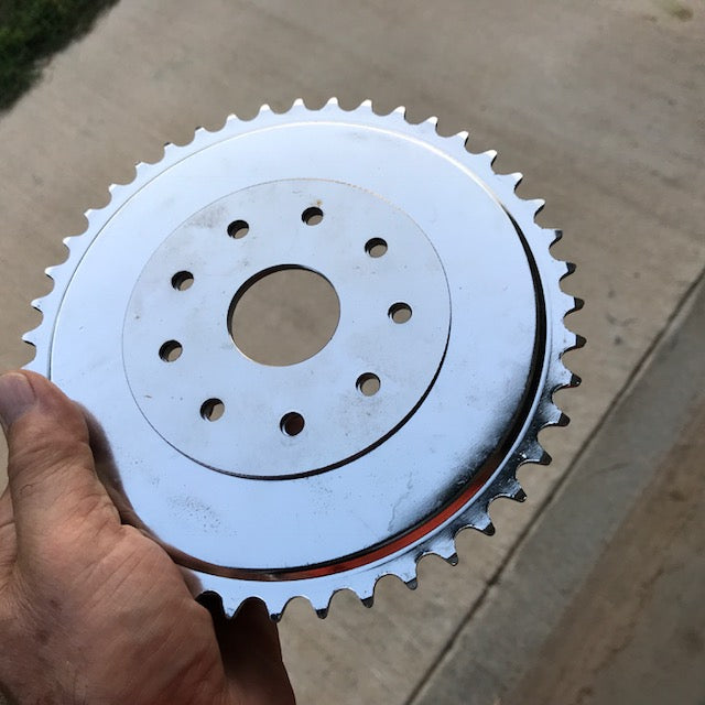 Clamp to spokes Chain sprocket alignment disc.