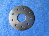 Clamp to spokes Chain sprocket alignment disc.